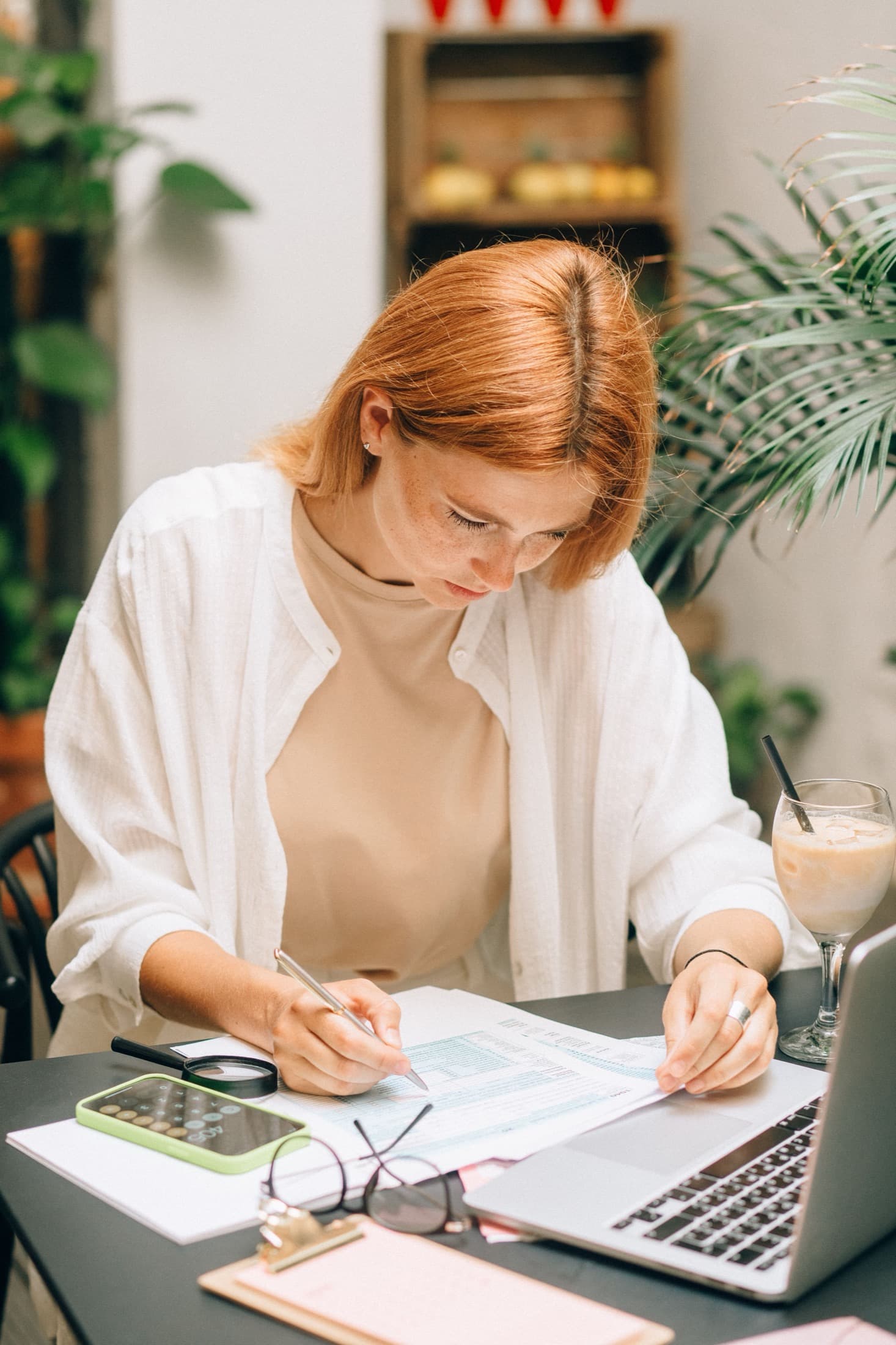A client completing tax paperwork